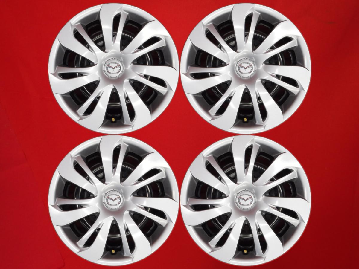 新品！ Mazda2 純正ホイールキャップ 黒と銀デザイン 打ち勝つ 4個セット